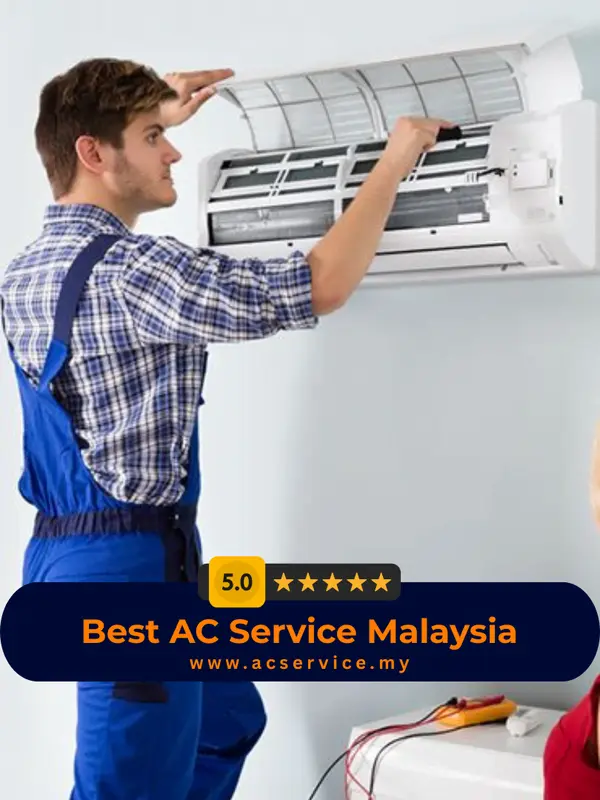 Aircond service technician cleaning wall mounted air conditioner in Malaysia